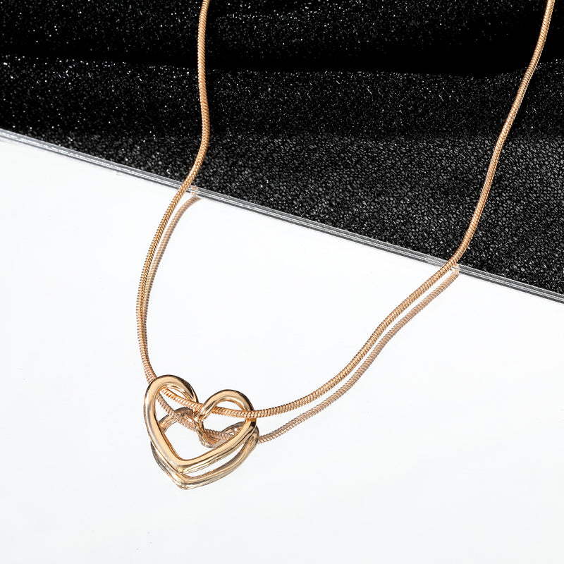 Minimalist Hollow Heart Necklace for Women in Alloy - 1