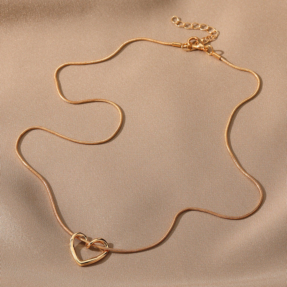 Minimalist Hollow Heart Necklace for Women in Alloy