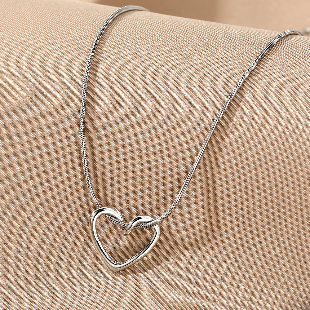Minimalist Hollow Heart Necklace for Women in Alloy