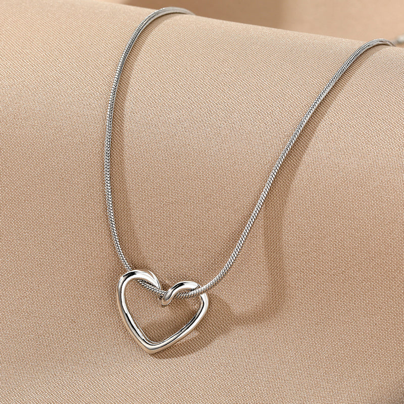 Minimalist Hollow Heart Necklace for Women in Alloy - 4